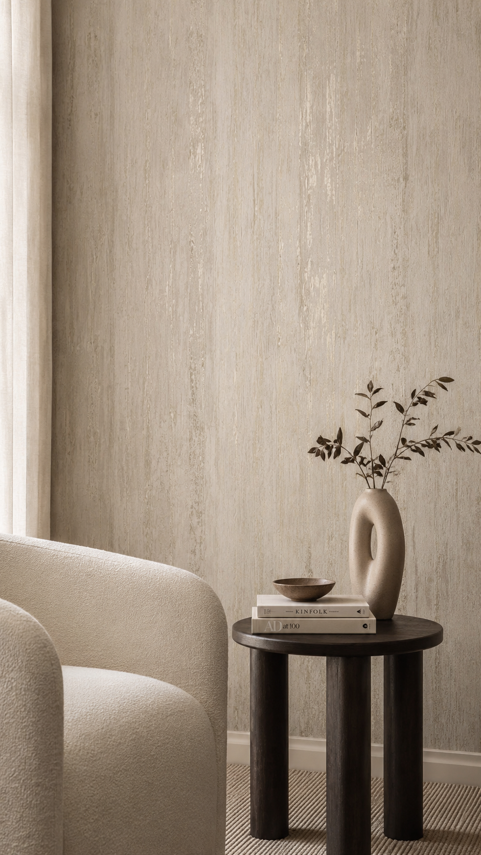 Hallway textured wall with leaf pattern, recessed lighting, marble flooring, wood accents, framed art, and console table decor