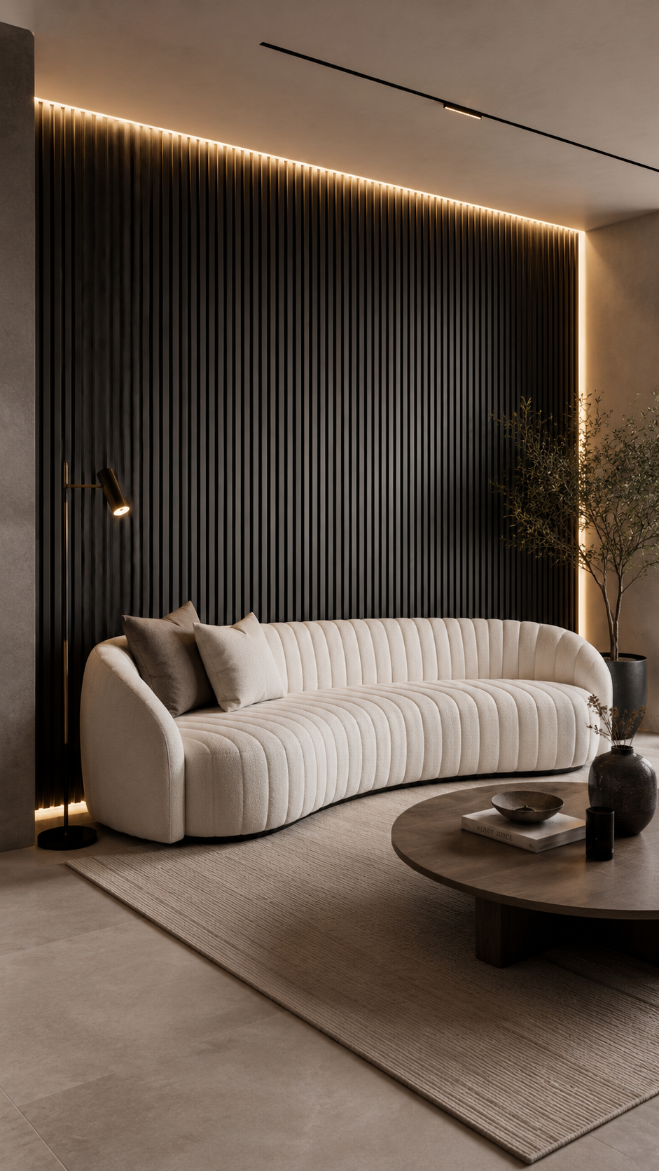 Dark marble-style textured wall bedroom with geometric panels, hidden lighting, dark headboard, white bedding, and burgundy pillow