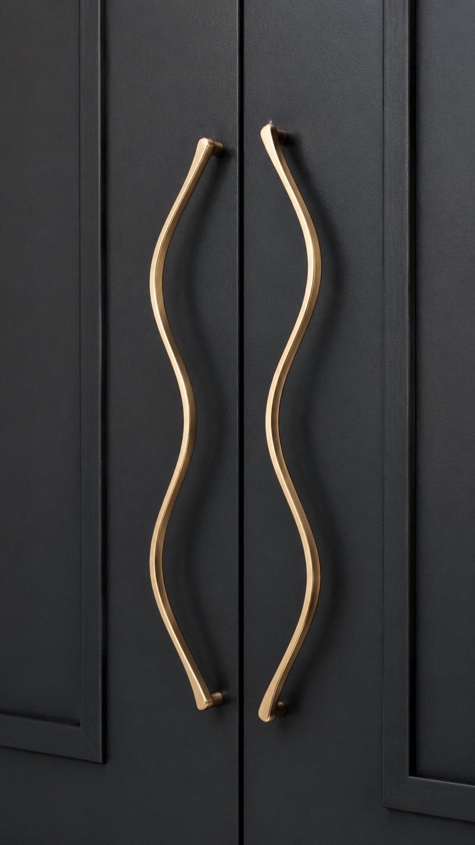 Modern geometric gold door handle with circular detail, walnut wood door, long vertical pull, and luxury wardrobe hardware style