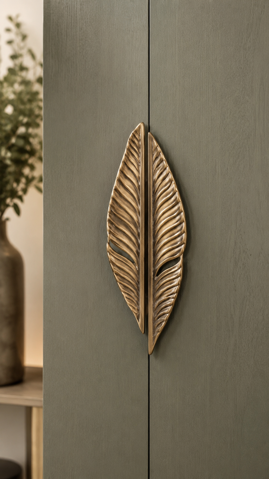 Modern gold lever door handle with round backplate, matching key lock, ribbed grip, and warm wooden door design