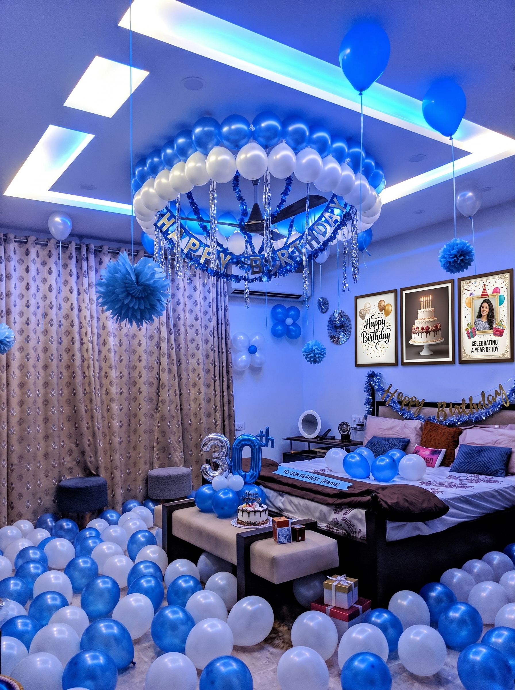 Blue birthday room decoration with blue and white balloons, banners, LED lights, gifts, and decorated bed