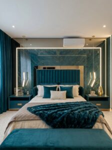 Burgundy luxury bedroom with glowing oval wall feature, velvet bedding, gold pillows, dark wood panels, pendant globe lights, and herringbone floor