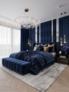 Teal luxury bedroom with marble feature wall, velvet bed, LED border, mirrored accents, gold decor, pendant lights, and bench seating